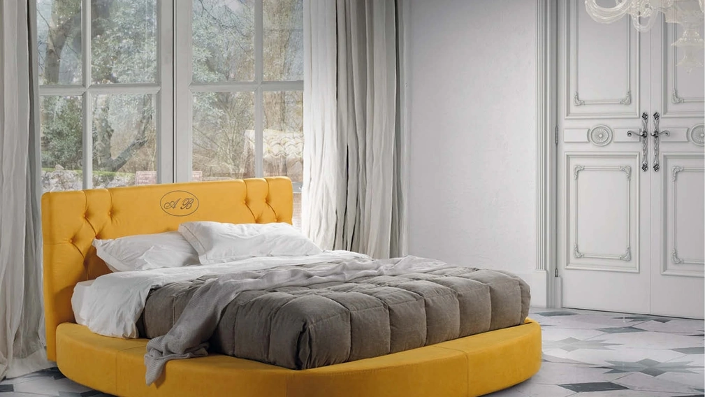 Letto in pelle dalla forma tonda con testiera imbottita e trapuntata Athena di Lettissimi