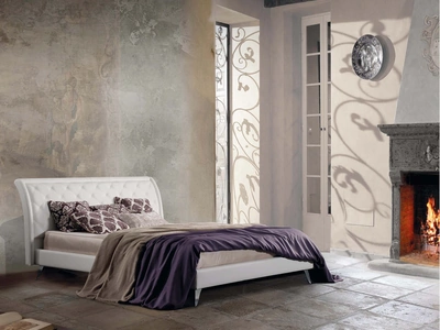 Letto in tessuto con testiera trapuntata in lavorazione capitonné Charme di Lettissimi