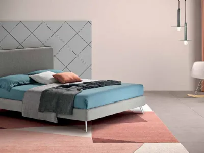 Letto semplice e lineare in tessuto con testiera Border di Cosmo Letti