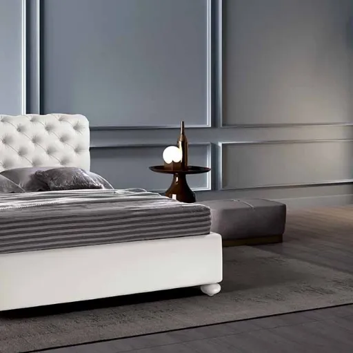 Letto imbottito classico con testiera capitonnè in pelle Cefeo di Cosmo Letti