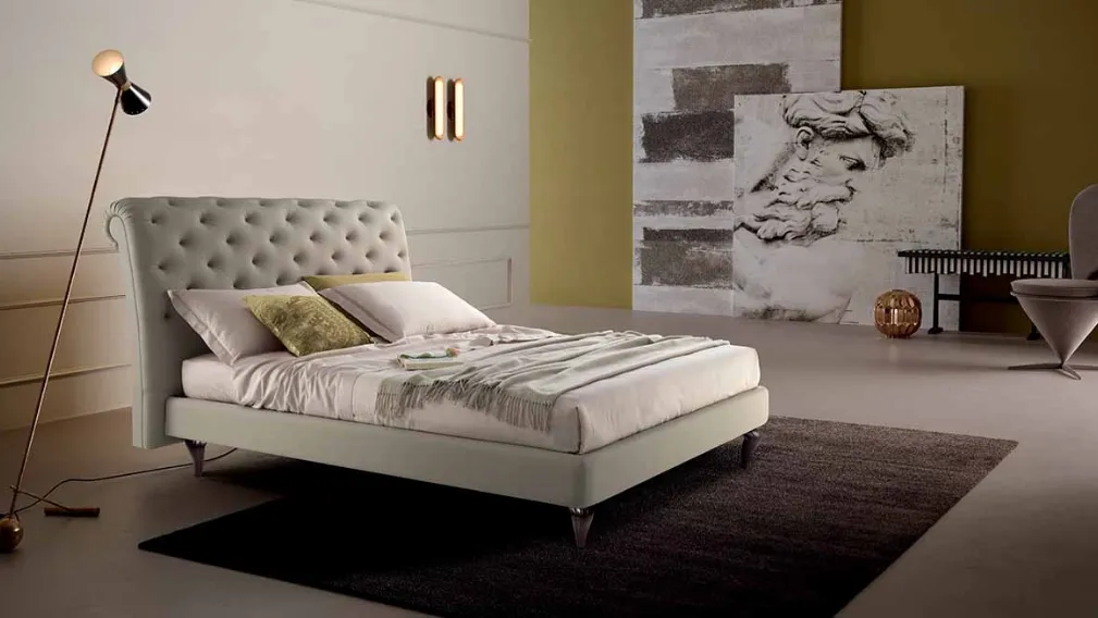 Letto in pelle con testiera lavorazione capitonnè rivisitata senza bottoni Eridano Cosmo Letti