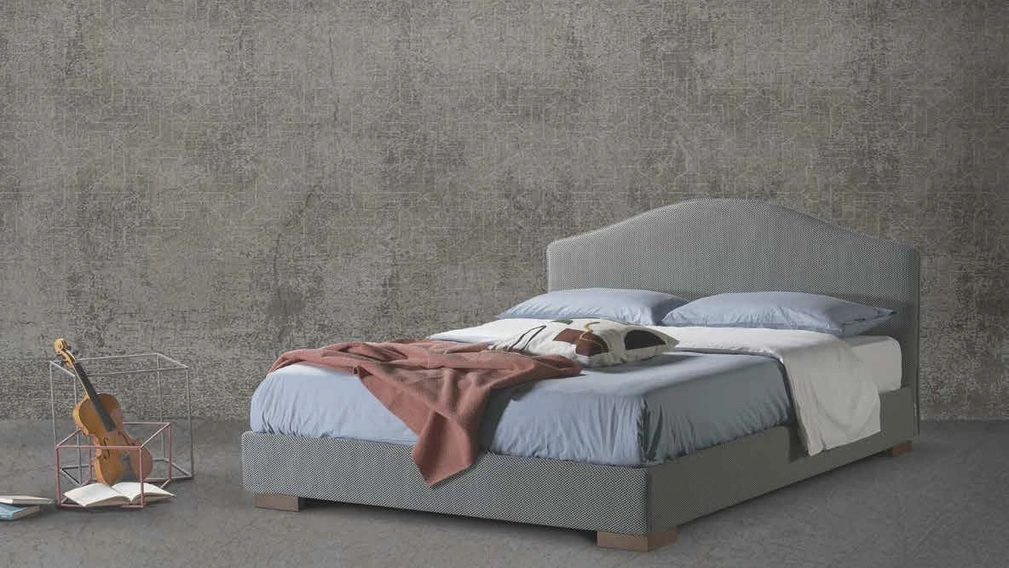 Letto in tessuto con testiera sagomata Cassiopea di Lettissimi