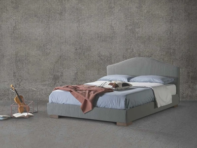 Letto in tessuto con testiera sagomata Cassiopea di Lettissimi