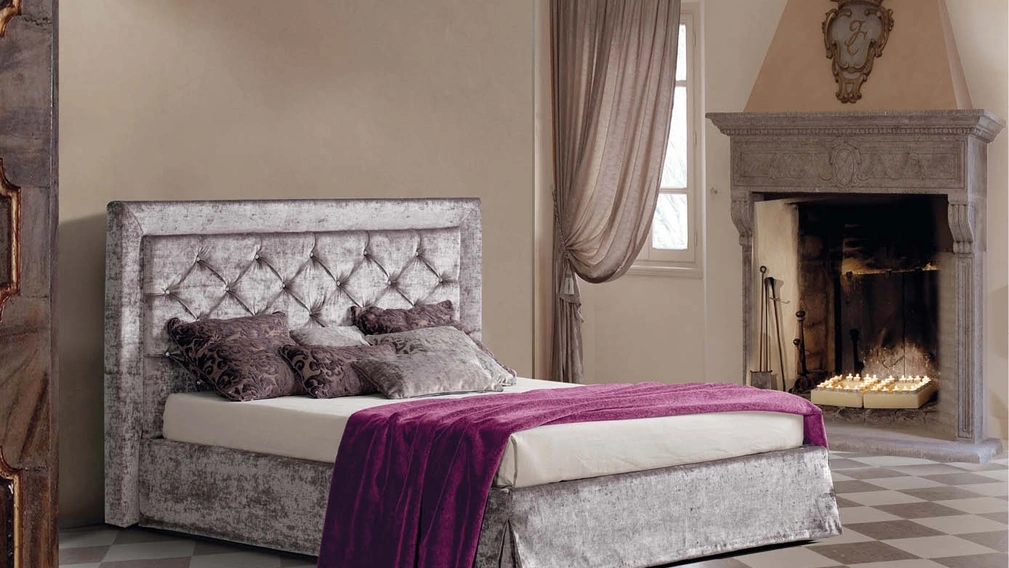 Letto in tessuto con testiera trapuntata Immagine di Lettissimi