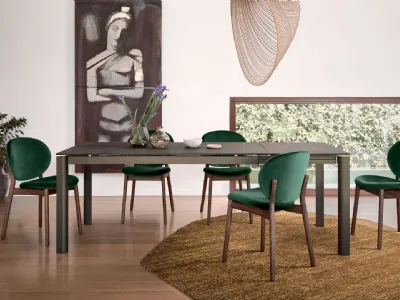 Tavolo allungabile con piano in ceramica effetto bronzo e gambe in alluminio Stream di Calligaris